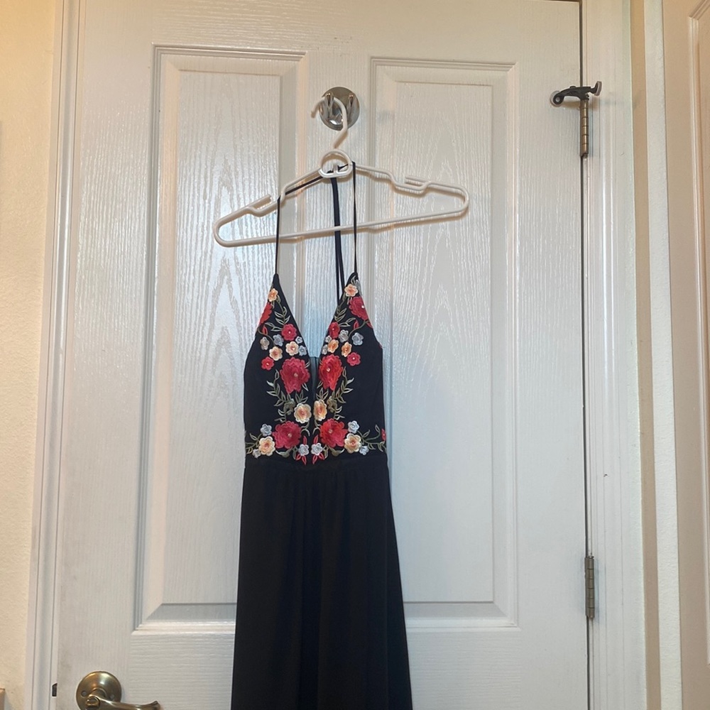 Beautiful prom dress with flowers on the front and lace back